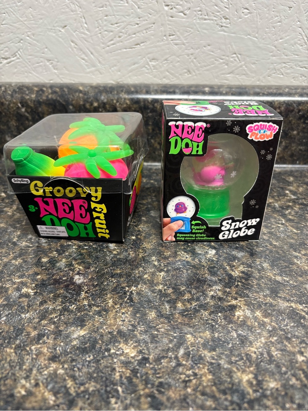 Needoh Lot. Groovy Fruit and Santa Snow Globe.